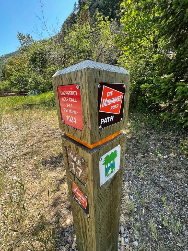 Milwaukee Road Path waymarker on bike trail in Missoula, Montana (Credit: Gatherandgotravel.com)