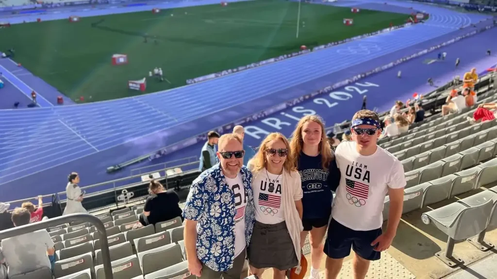 American family of four photo at the Stade de France during the Paris 2024 Olympics